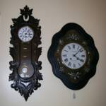 Left - Black Forest, Hand Carved, Time Only Wall Clock, Spring Wound - Ca 1880. Right - French "Prayer Clock - Repeater" Half Hr. & Hr. Strike, (Also referred to as "Picture Frame" Clock) Ca 1890.